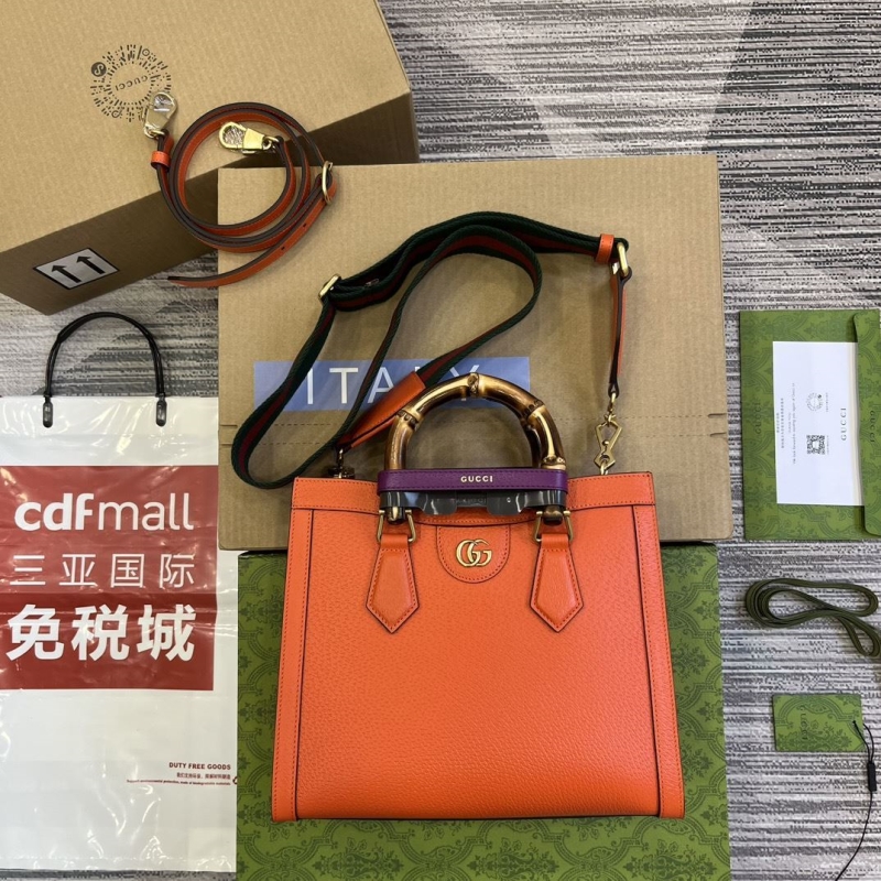 G*u*i top handle bags